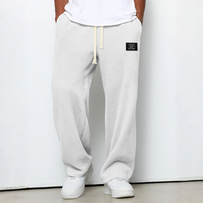 Elias | Spodnie z troczkiem w luźnym kroju